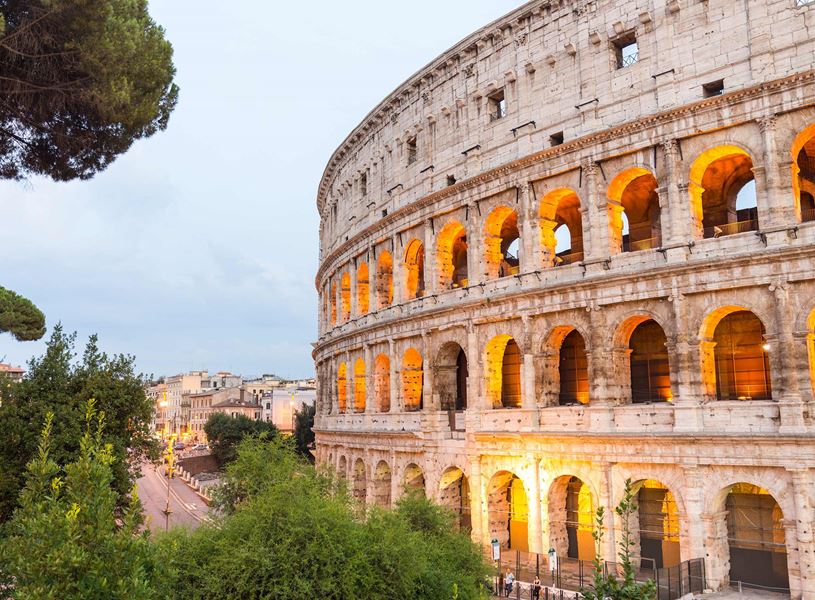 External view of the illuminated Colosseum in Rome, Italy