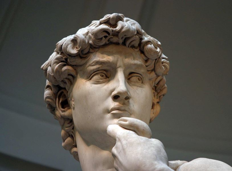 A detailed view of Michelangelo’s David statue in Florence, Italy