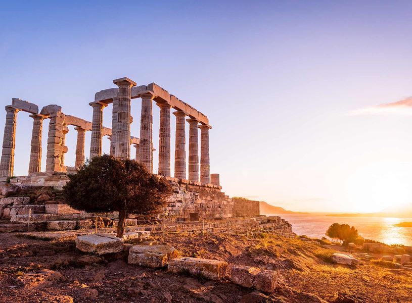 Temple of Poseidon at sunset in Cape Sounion, Greece