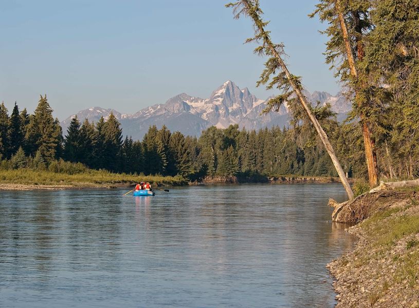 Visitors on a Snake River float in Grand Teton National Park, Wyoming, USA